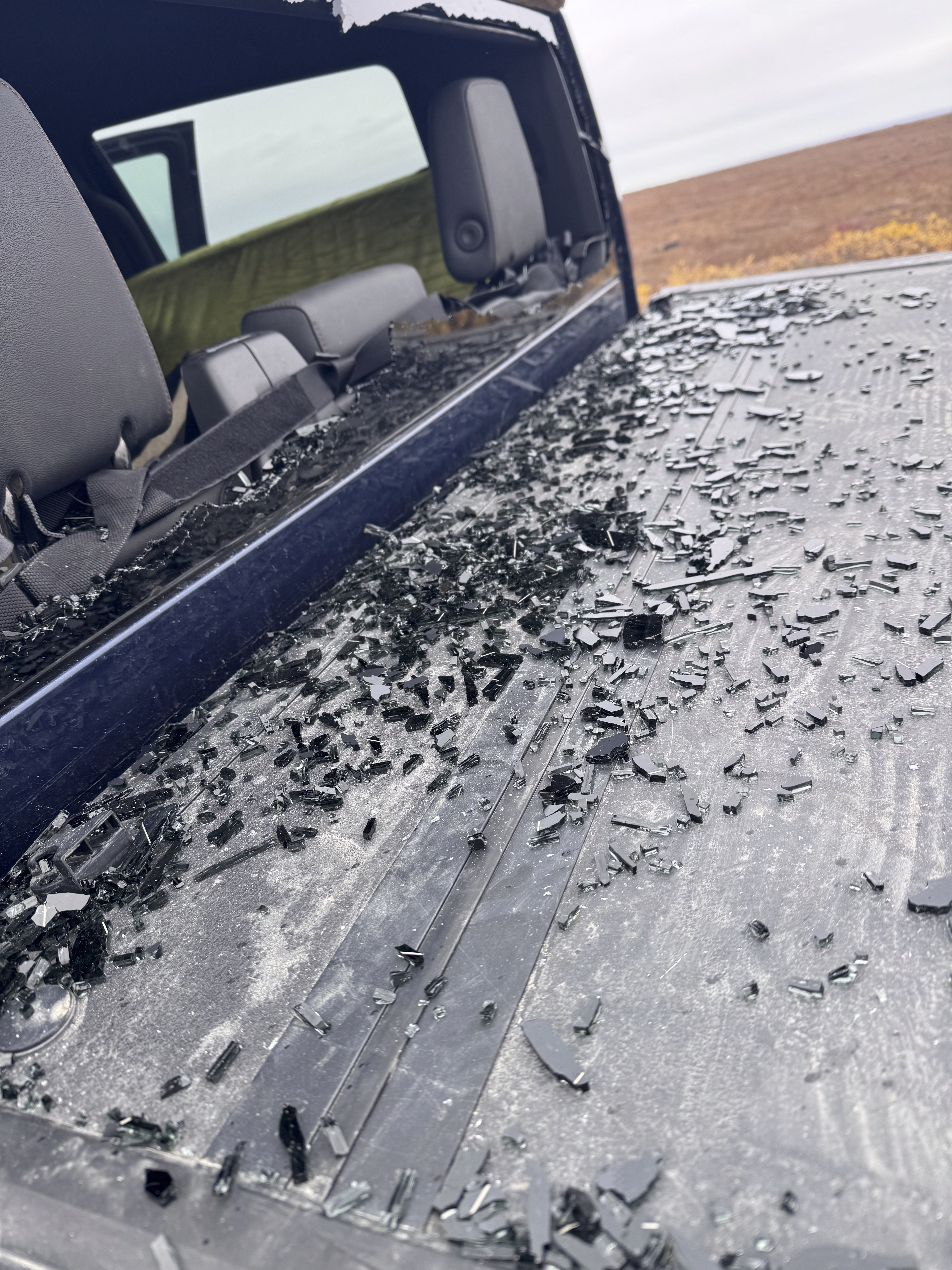 Makeshift tarp window repair